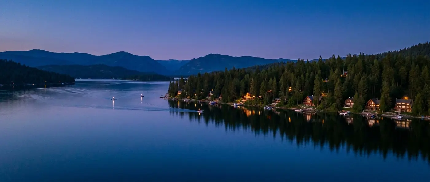 Lake Coeur d'Alene at twilight — luxury waterfront segment